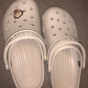 Cream colored crocs